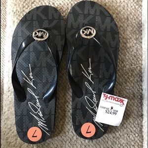 Brand new Michael Kors flip flops. Size 7.